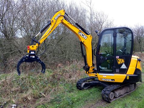 mini digger grapple uk|log grab for digger.